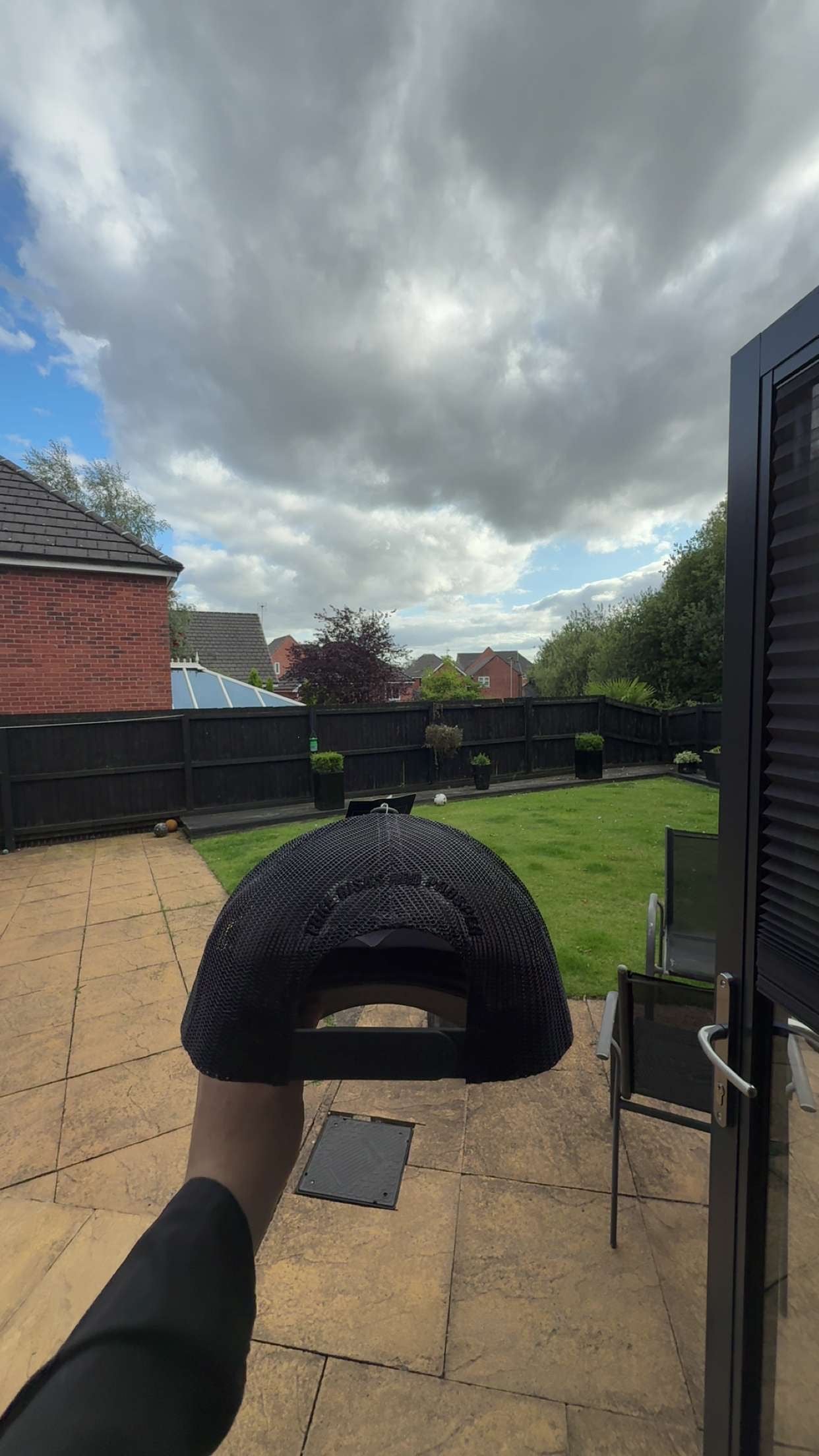 grey and black REVALT “TAKE RISKS AND PROSPER” cap