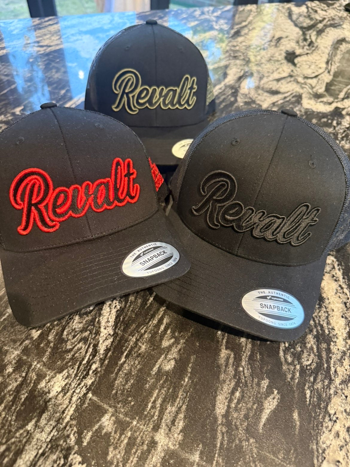 Revalt “consistency is key” red and black cap