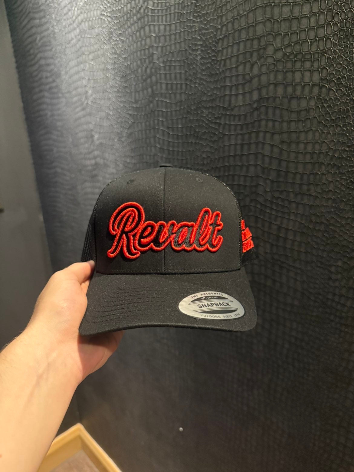 Revalt “consistency is key” red and black cap