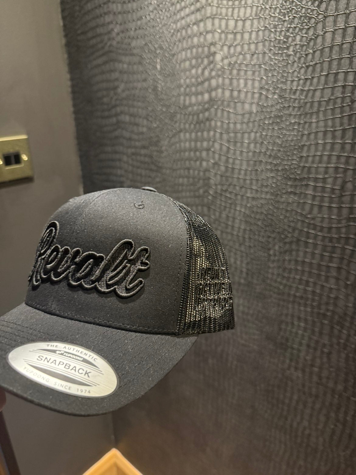 Revalt “consistency is key” full black cap