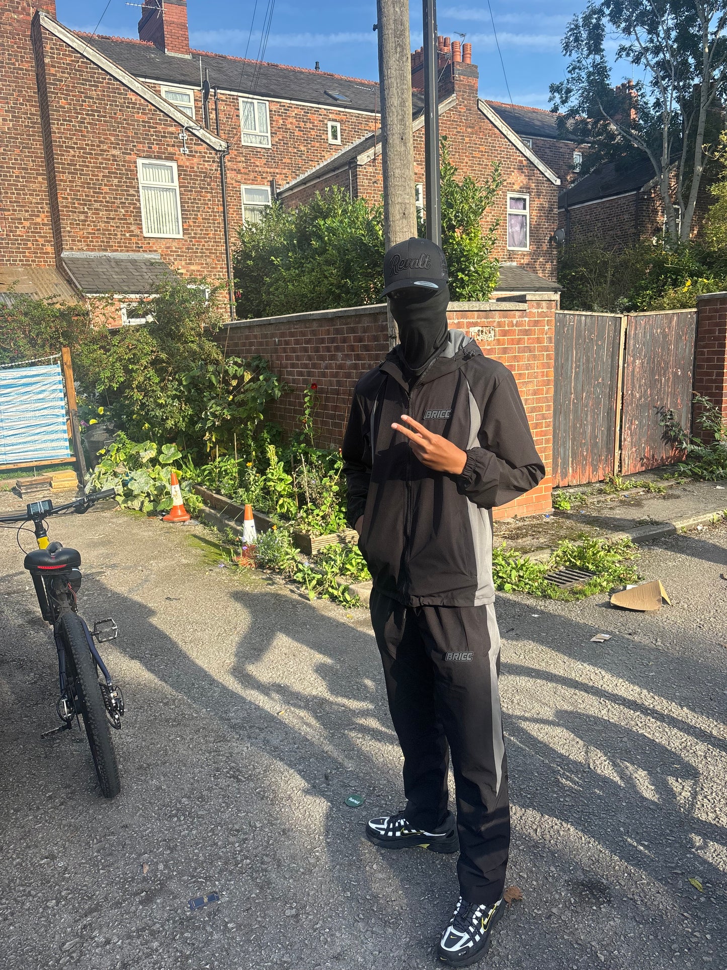 Revalt “consistency is key” full black cap